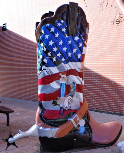 boot with American flag and cowboys riding bulls